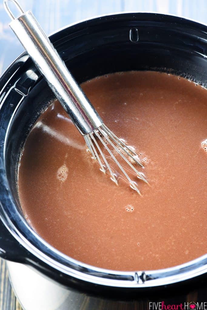 Slow Cooker Hot Chocolate being whisked.