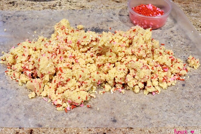 Dough dumped out onto wax paper.