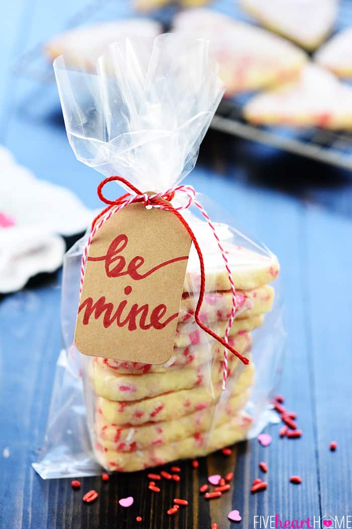 Heart shaped cookies in cellophane bag with tag for Valentine gift giving.