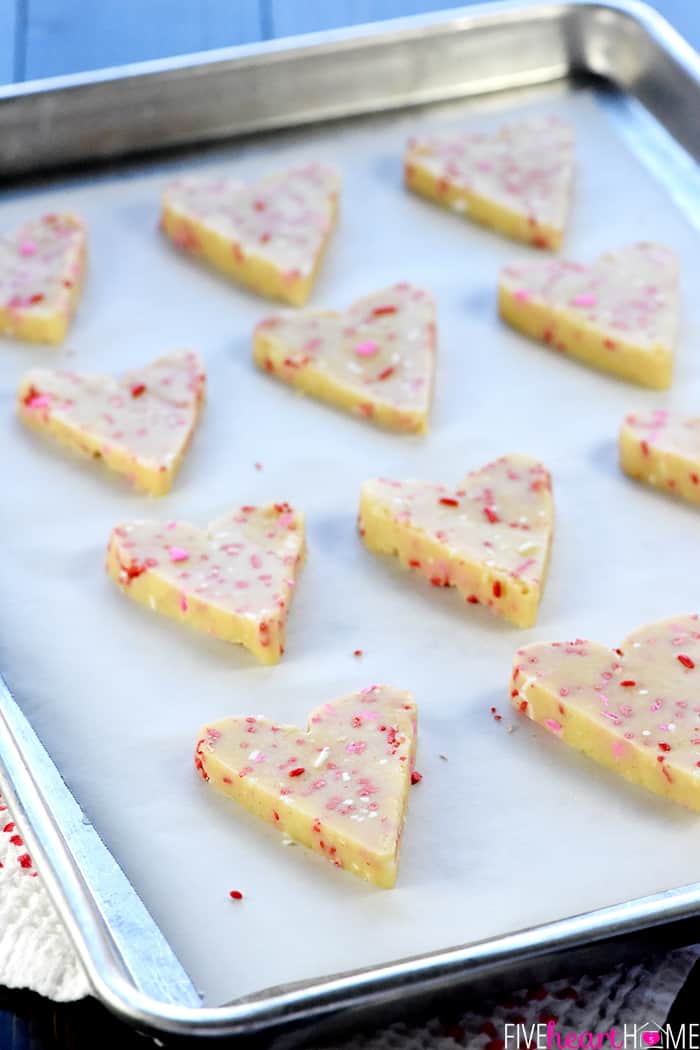 Baking sheet of heart cookies ready to go into oven.