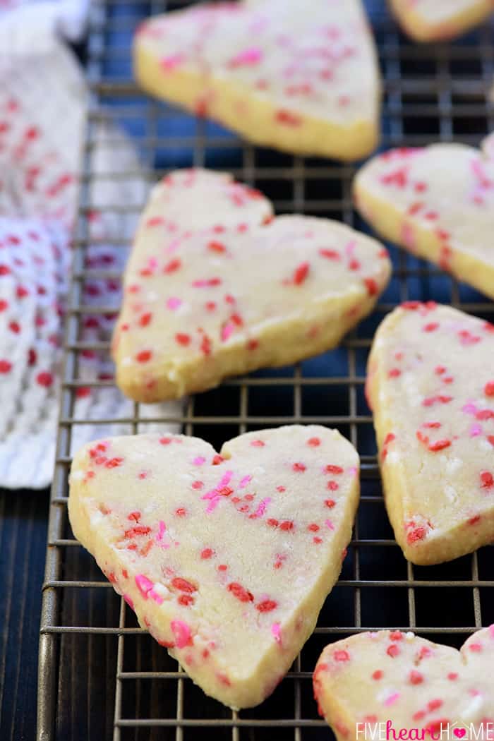 Heart cookies cooling on rack.