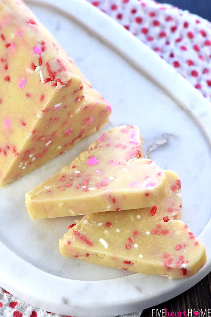 Slicing heart shaped cookies.