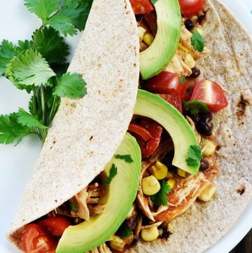 Aerial view of Instant Pot Chicken Tacos on plate.