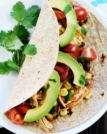Aerial view of Instant Pot Chicken Tacos on plate.