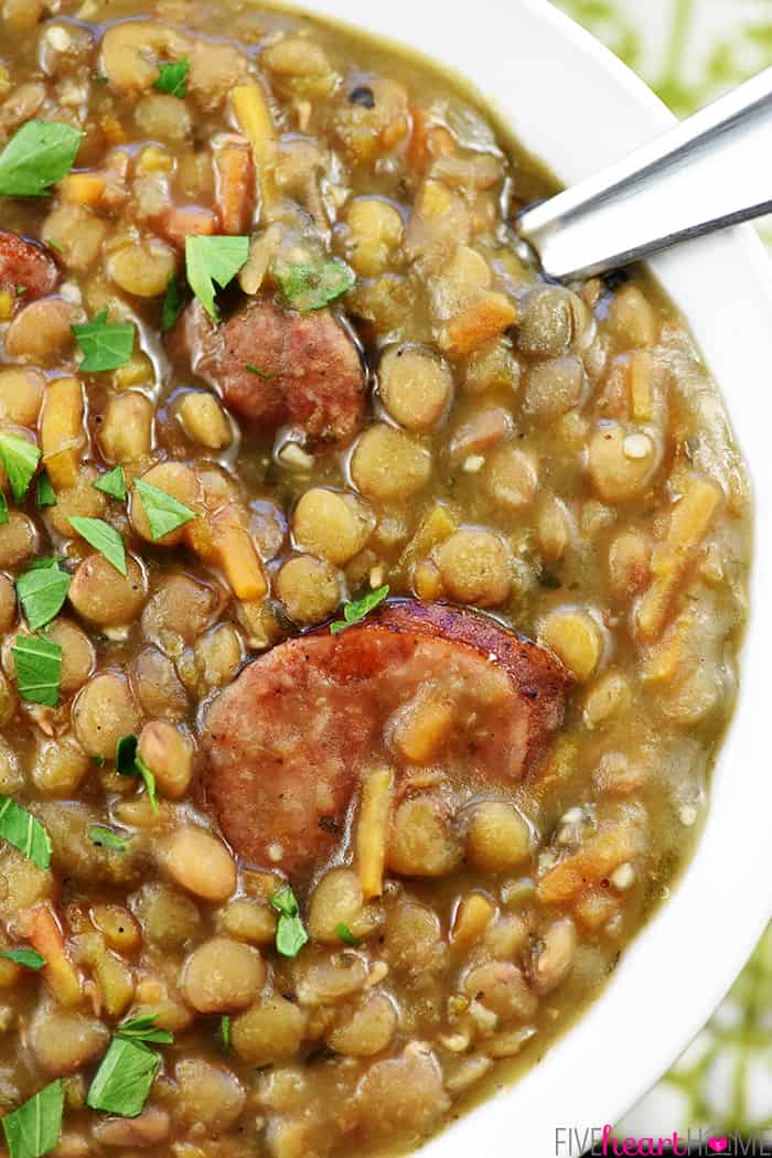 Instant Pot German Lentil Soup ~ a savory, hearty pressure cooker recipe loaded with wholesome lentils, healthy carrots, and flavorful garlic, herbs, and spices, with the option of adding sausage or ham! | FiveHeartHome.com Aerial close-up.