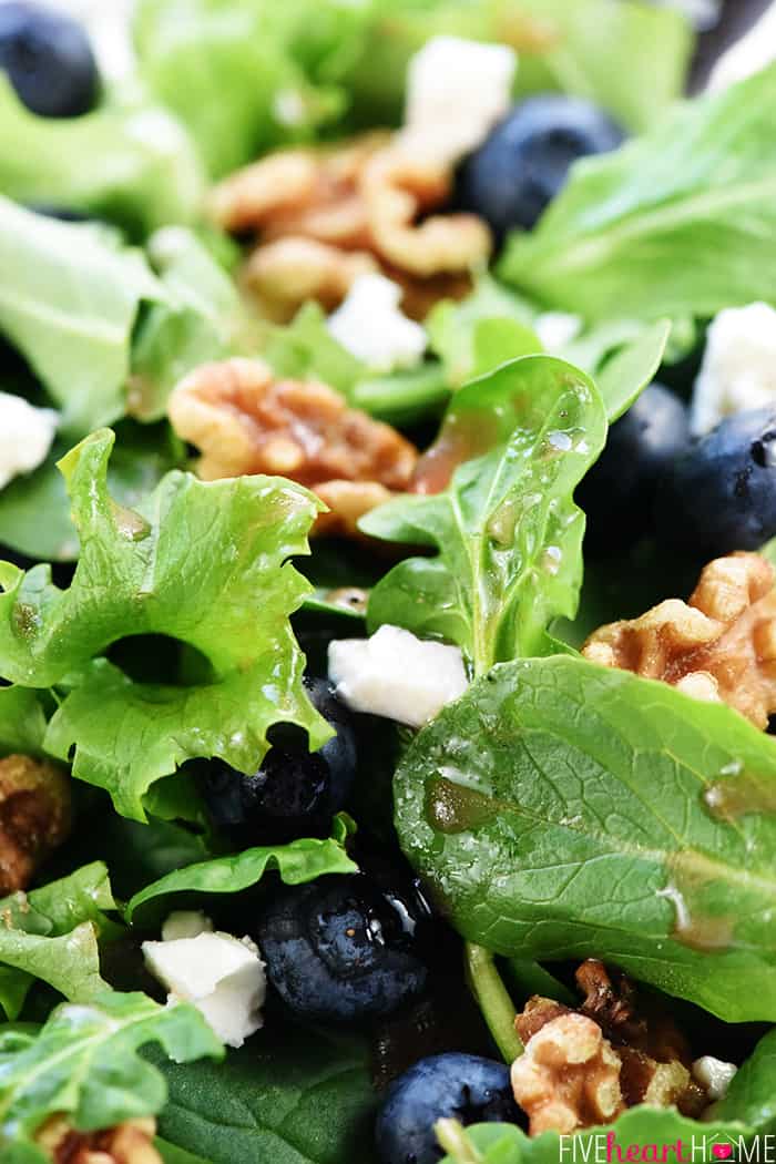 Close-up of vinaigrette drizzled over Brain Healthy Salad.