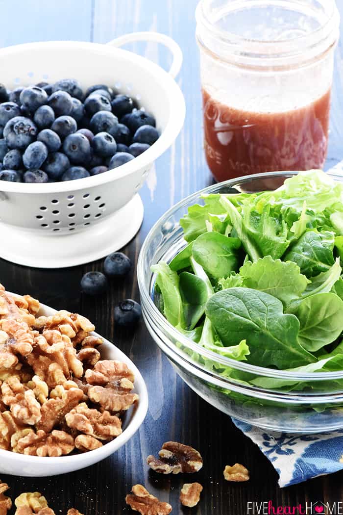 Brain Healthy Salad ~ loaded with leafy greens, blueberries, walnuts, and extra-virgin olive oil for an easy, tasty way to enjoy brain-protective foods in your diet! | FiveHeartHome.com Brain healthy ingredients on table.