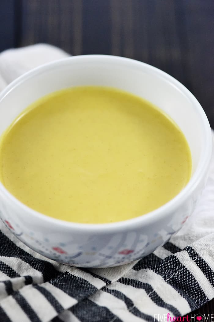 Healthy Homemade Honey Mustard ~ this lightened-up dipping sauce recipe comes together in a few minutes with only five ingredients, including healthy Greek yogurt and no mayo! | FiveHeartHome.com Close-up Shot of Honey Mustard in Decorative Bowl