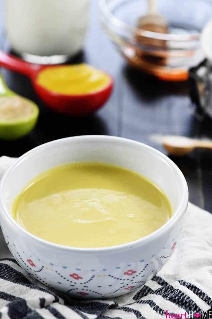 Healthy Homemade Honey Mustard ~ this lightened-up dipping sauce recipe comes together in a few minutes with only five ingredients, including healthy Greek yogurt and no mayo! | FiveHeartHome.com Homemade Honey Mustard in decorative bowl