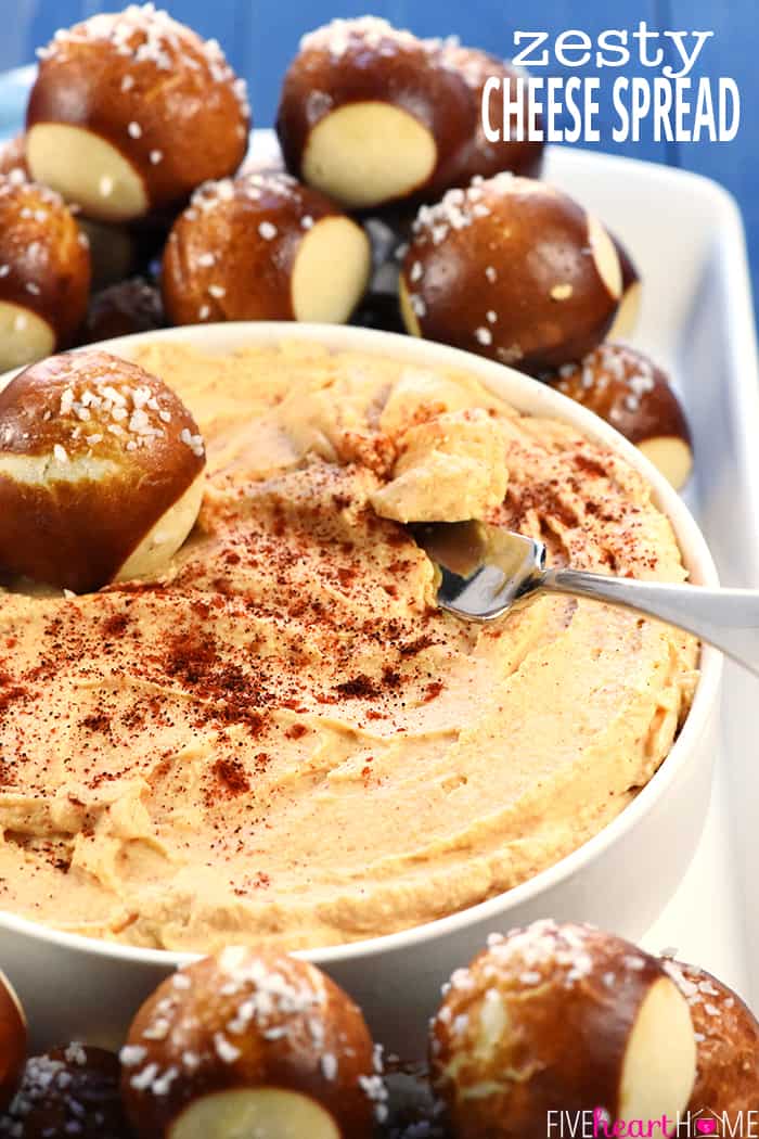 Zesty Cheese Spread ~ quick to make, delicious on pretzels, crackers, or raw veggies, and a perfect recipe for Super Bowl Sunday! | FiveHeartHome.com Zesty Cheese Spread with text overlay.