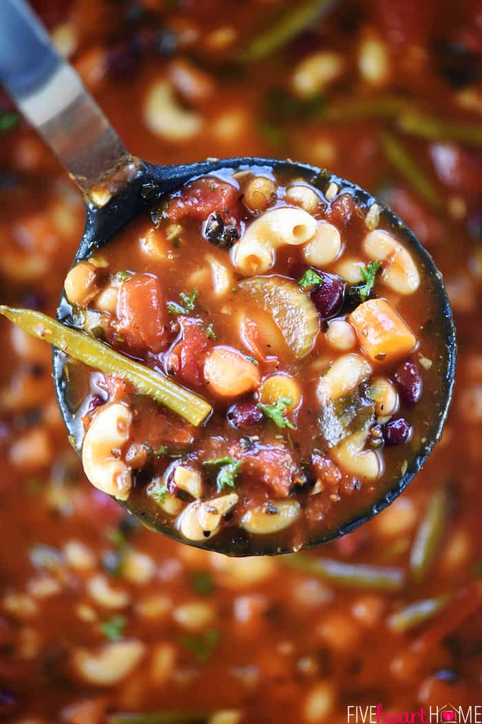 Ladle of Easy Minestrone Soup over pot.