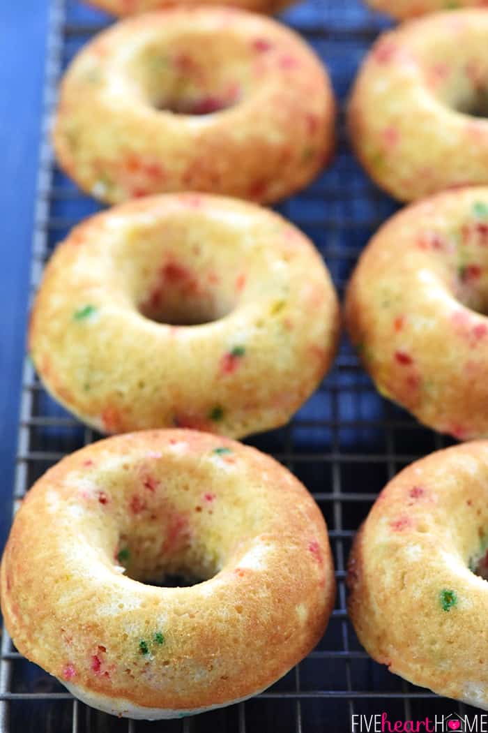 Close-up of Baked Funfetti Donuts on cooling rack.