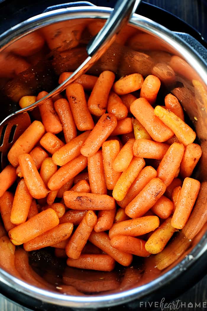 Aerial view of glazed Instant Pot Carrots in pressure cooker.