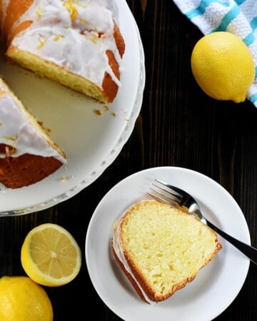 Aerial view of easy Lemon Pound Cake on platter and plate.