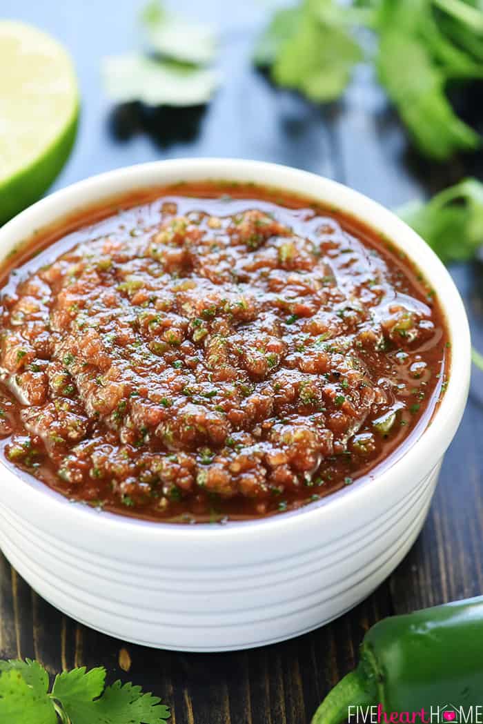 White serving bowl filled with the best salsa recipe.