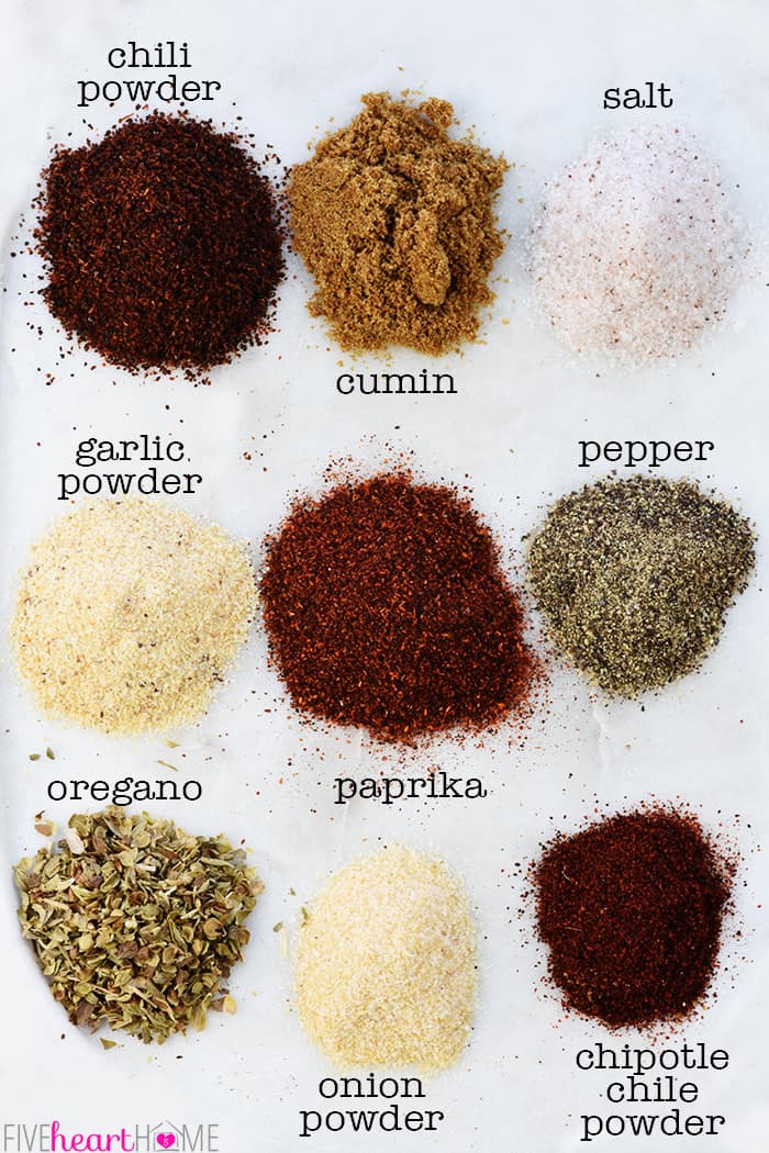 Homemade Taco Seasoning ~ you control the ingredients in this economical, easy-to-make homemade seasoning mix recipe...perfect for your favorite tacos or Mexican food recipes! | FiveHeartHome.com Overhead shot of labeled spices or ingredients.