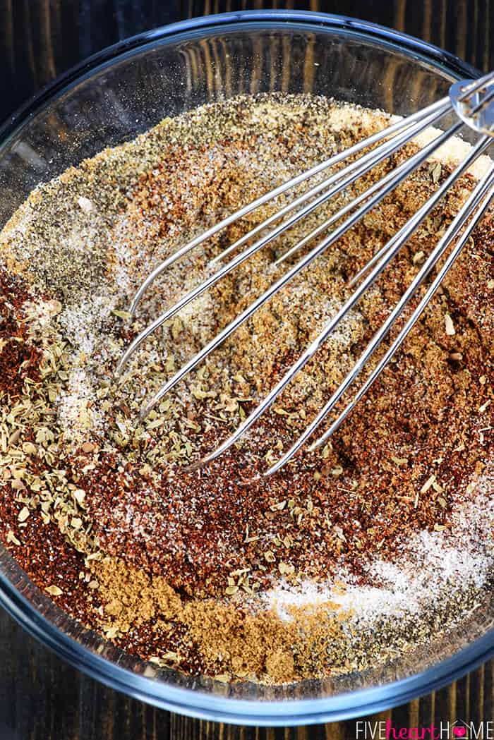 Whisking ingredients together in a bowl.