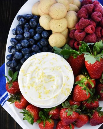 Lemon Cream Cheese Dip, aerial view on platter with fruit and cookies.
