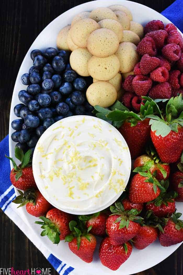 Lemon Cream Cheese Dip, aerial view on platter with fruit and cookies.