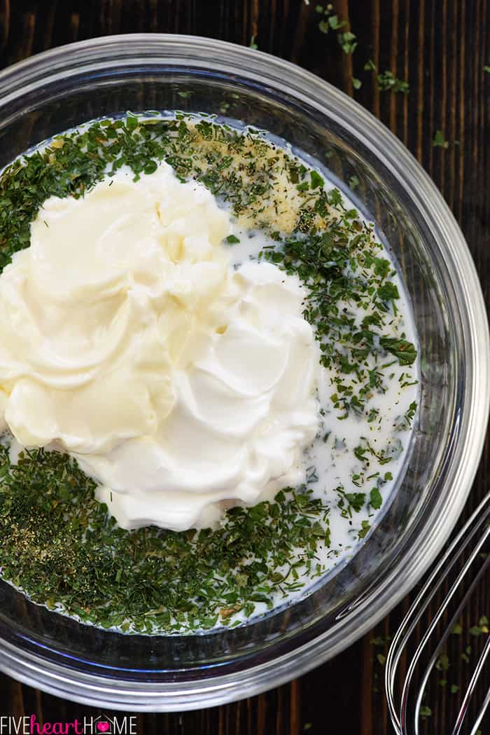 Aerial view of Ranch Dressing Mix plus other ingredients to make a batch of dressing.