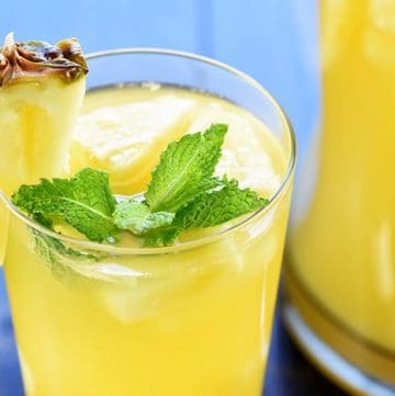 Sparkling Pineapple Sangria ~ a bubbly, refreshing, tropical summer cocktail made with just five ingredients, perfect for poolside, parties, and BBQs! | FiveHeartHome.com