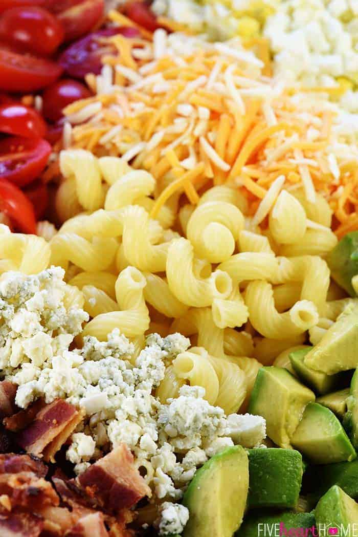 Aerial view of Cobb Pasta Salad ingredients before they're mixed together.