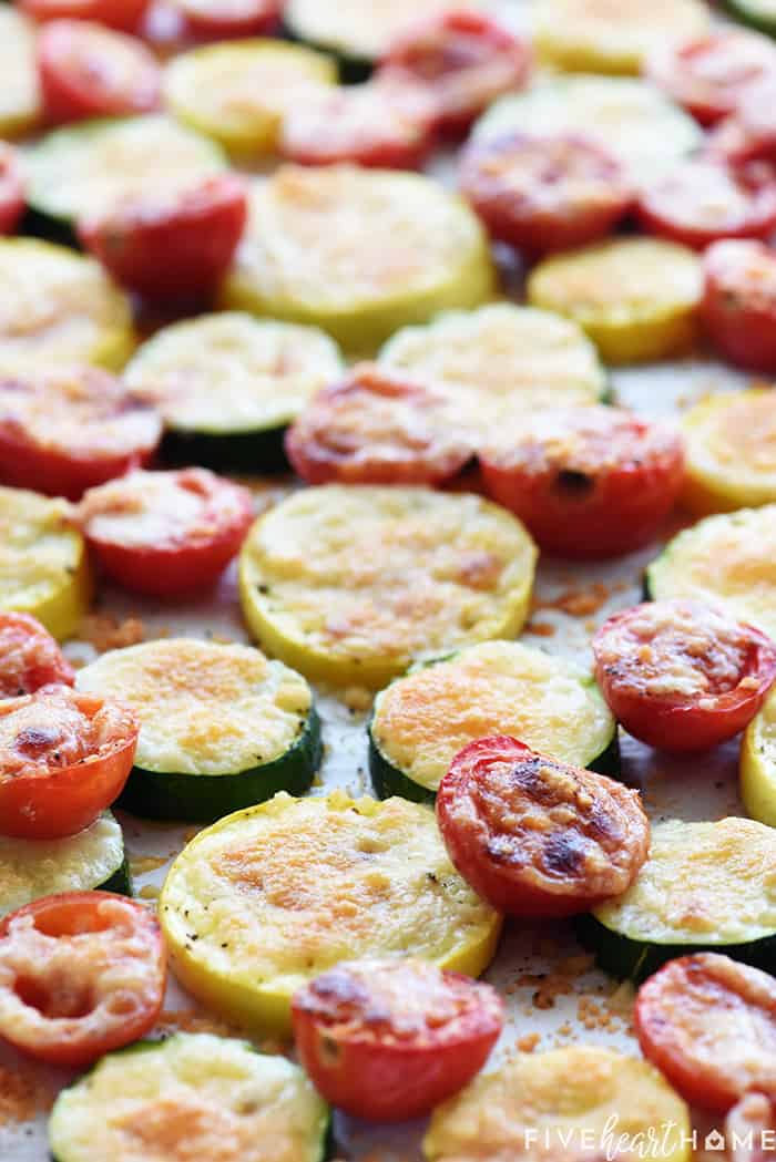 Close-up of Baked Parmesan Summer Veggies on baking pan.