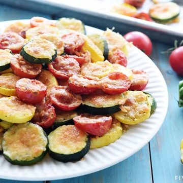 Baked Parmesan Summer Veggies ~ featuring roasted zucchini, squash, & tomatoes topped with melty golden cheese, this tasty side dish recipe is simple to make and absolutely addictive! | FiveHeartHome.com