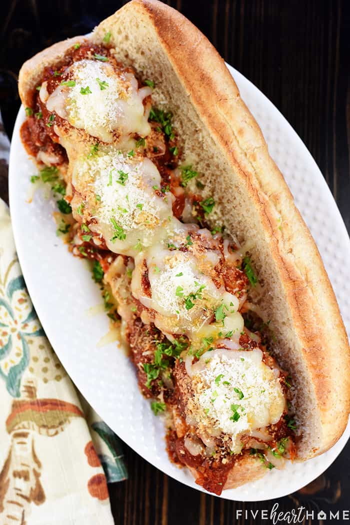 Aerial view of Chicken Parmesan Meatballs on a sub roll.