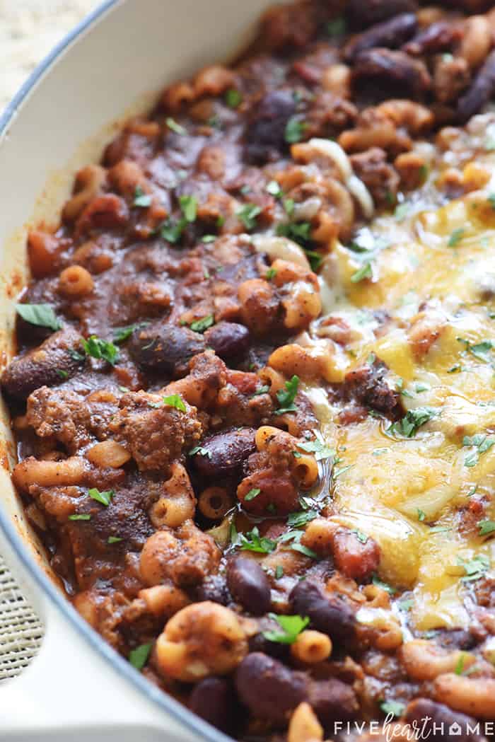 Chili Mac recipe in skillet with melted cheese on top.