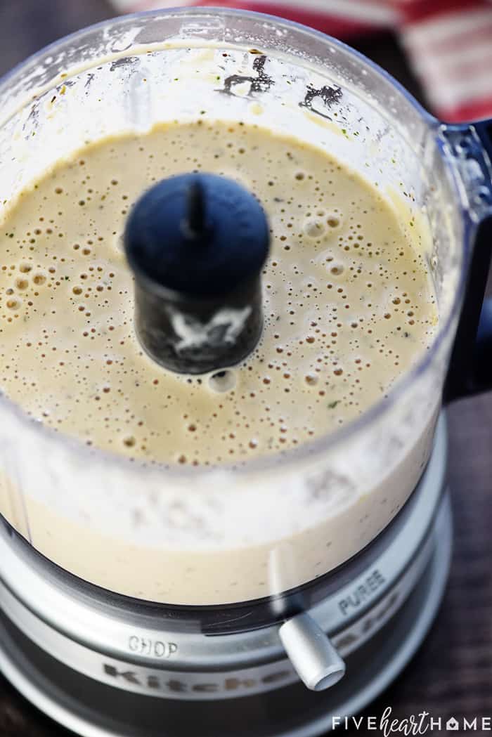 Homemade Creamy Italian Dressing ~ zesty, flavorful, and easy to make...a delicious topping for a crisp green salad or your favorite pasta salad! | FiveHeartHome.com Blending in a food processor