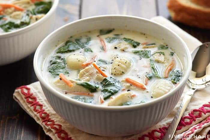 Slow Cooker Chicken Gnocchi Soup in white bowl.