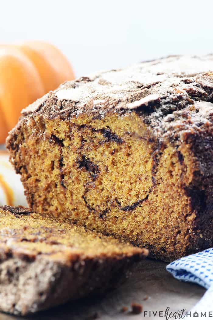 Snickerdoodle Pumpkin Bread ~ a sweet, moist pumpkin bread recipe, swirled and topped with a generous amount of cinnamon sugar, for a delicious fall treat! | FiveHeartHome.com Sliced loaf