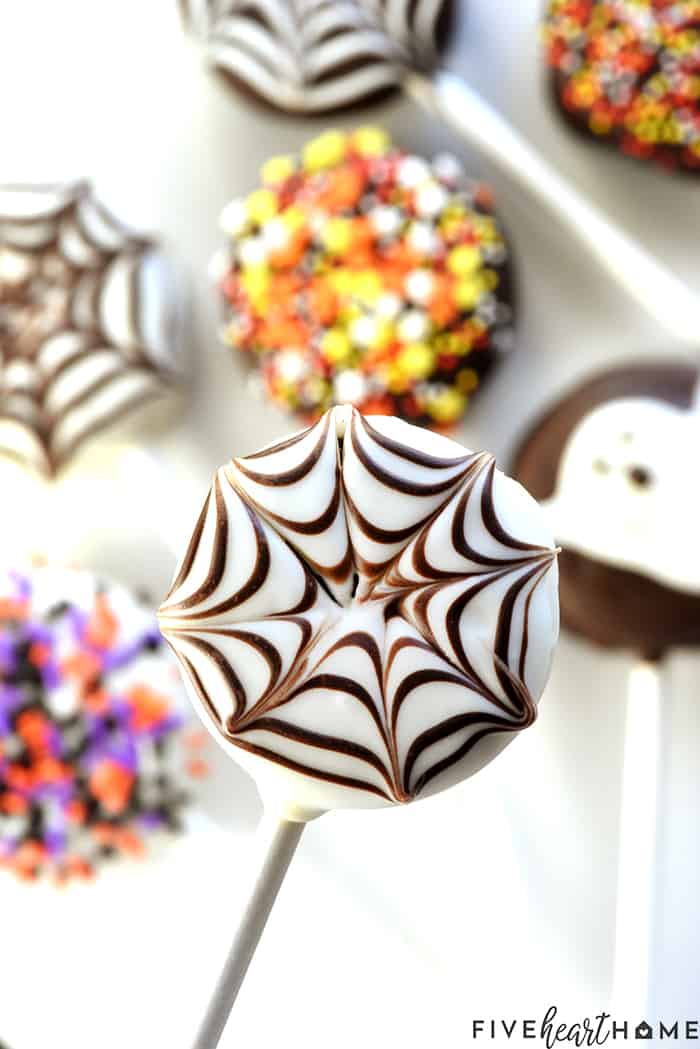 Spiderweb Oreo Pop plus other Halloween Oreo Pops in background