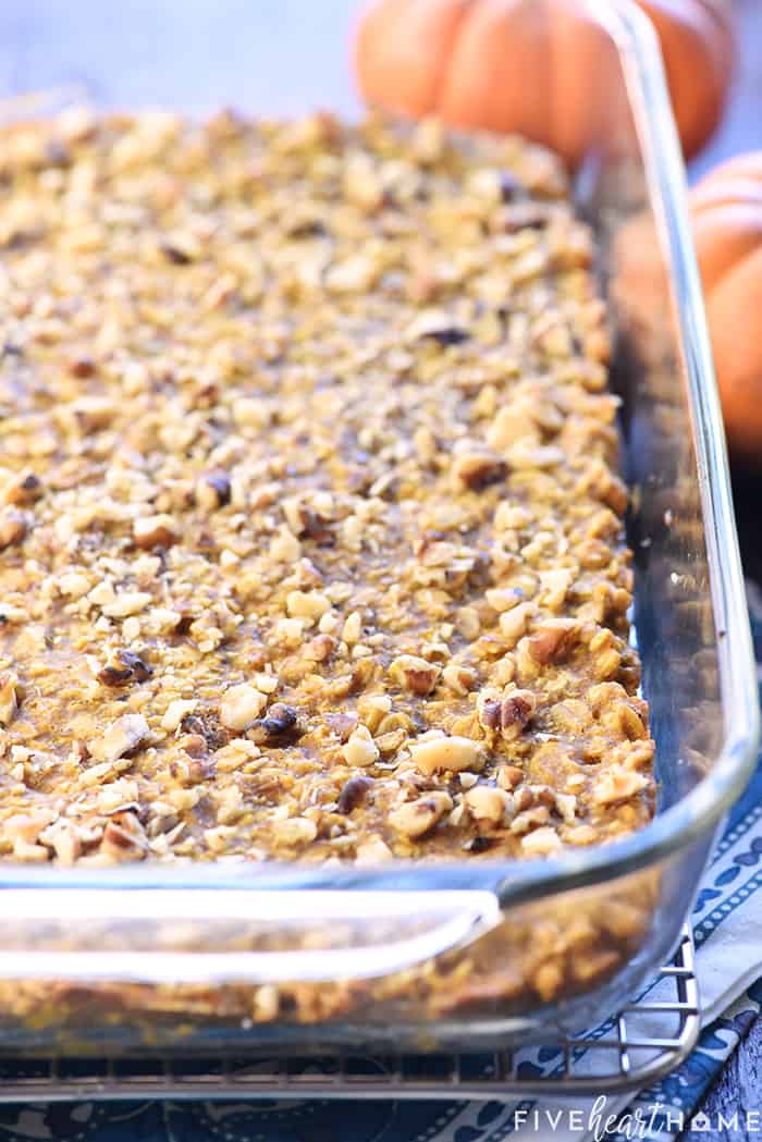 Healthy Pumpkin Breakfast Bars ~ soft-baked, chewy, and loaded with wholesome ingredients like oats, coconut oil, & honey for a grab-n-go breakfast or snack! | FiveHeartHome.com Pumpkin Oatmeal Breakfast Bars in Glass Baking Dish Fresh From the Oven
