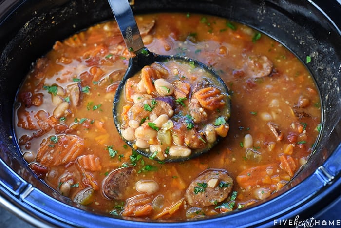 Slow Cooker Cajun White Bean Soup ~ a cozy crock pot recipe loaded with beans, andouille sausage, veggies, and a flavorful broth that's sure to warm you up! | FiveHeartHome.com