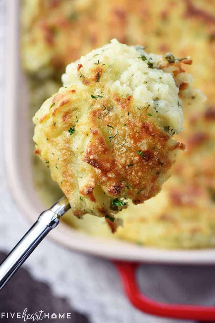 Spoonful of Make Ahead Mashed Potato casserole.