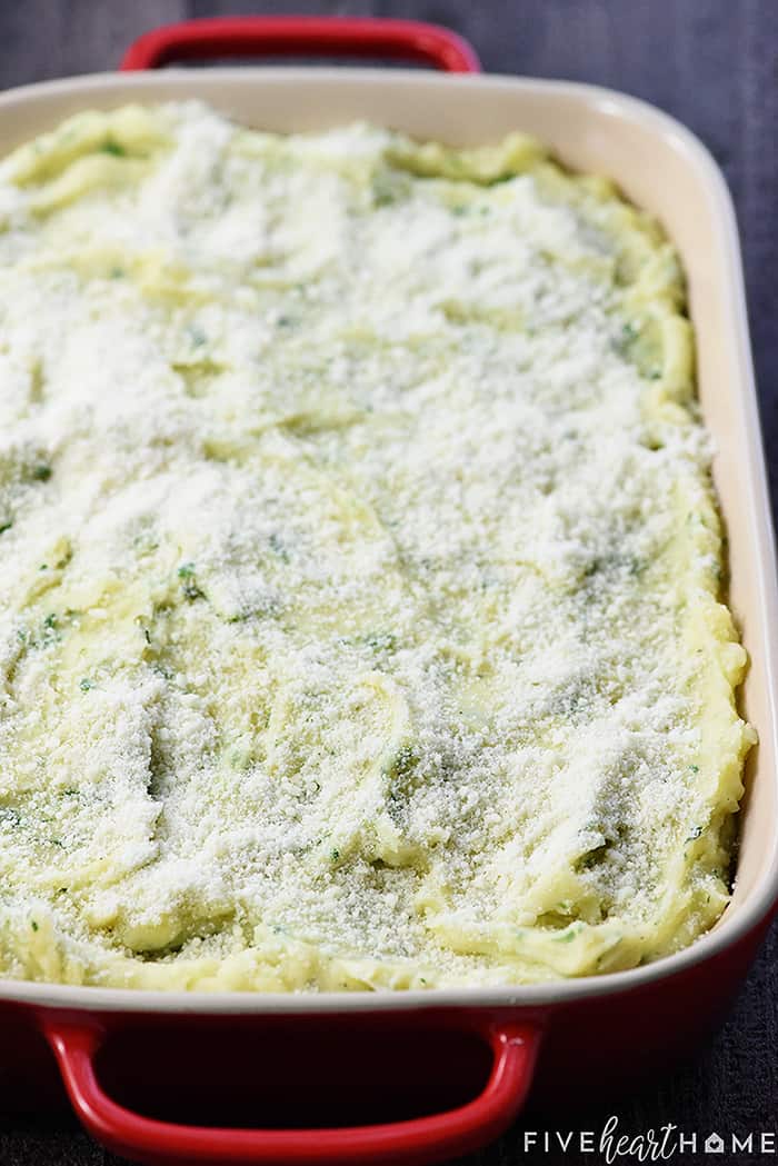 Dish sprinkled with Parmesan and ready to pop in oven.