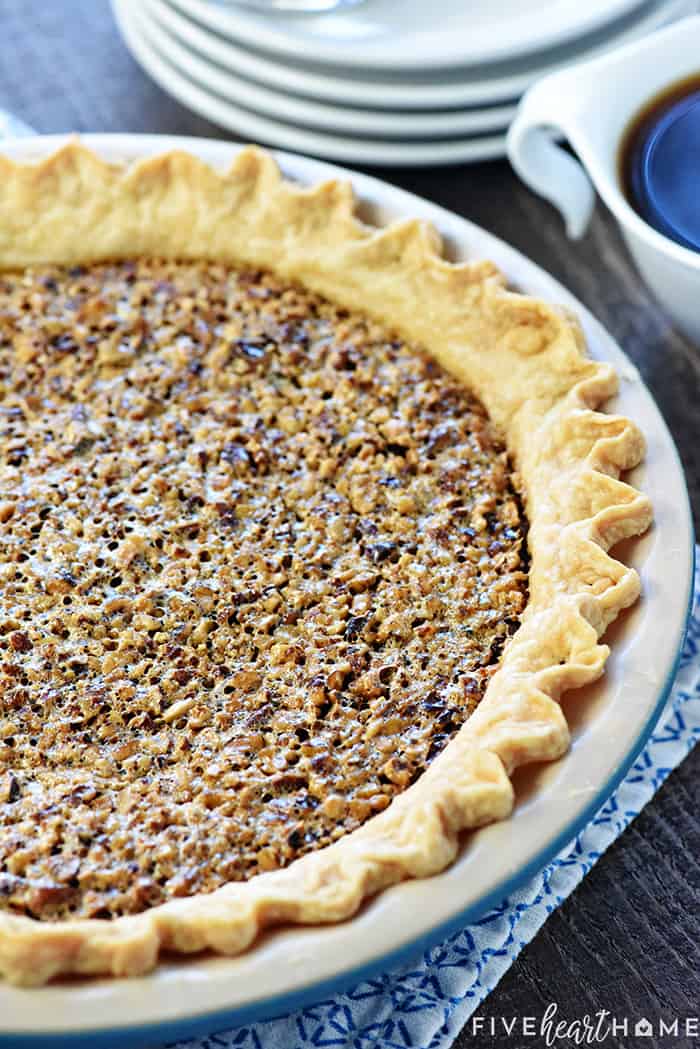 The BEST Pecan Pie ~ foolproof and perfect every time, with an abundance of toasty pecans floating on a thick, glossy filling in a flaky, all-butter pie crust! | FiveHeartHome.com Close-up of the Best Pecan Pie recipe.