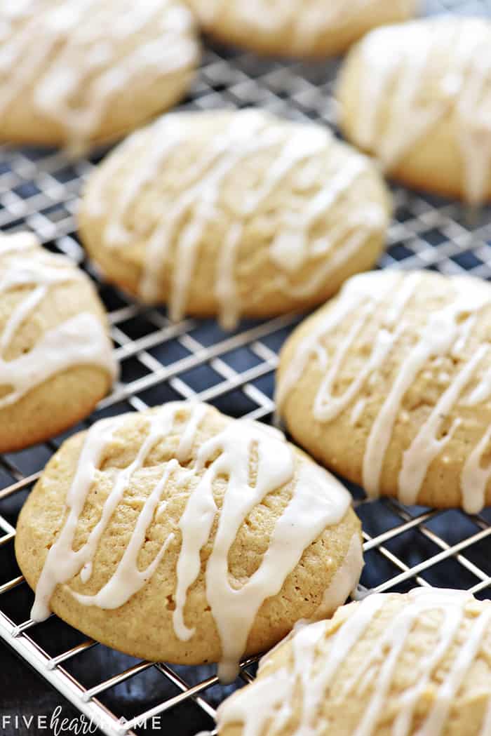 Eggnog Cookies on cooling rack drizzled with eggnog glaze.