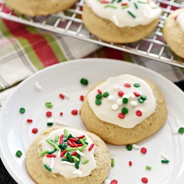 Eggnog Cookies ~ soft, tender, and delicately flavored with eggnog and spices before being topped with a sweet eggnog glaze and festive Christmas sprinkles! | FiveHeartHome.com