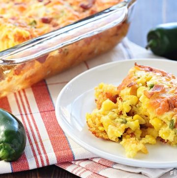Ultimate Cornbread Casserole ~ with the addition of bacon, cheddar, and jalapeño, this flavorful, from-scratch recipe takes the classic side dish to a whole new level! | FiveHeartHome.com