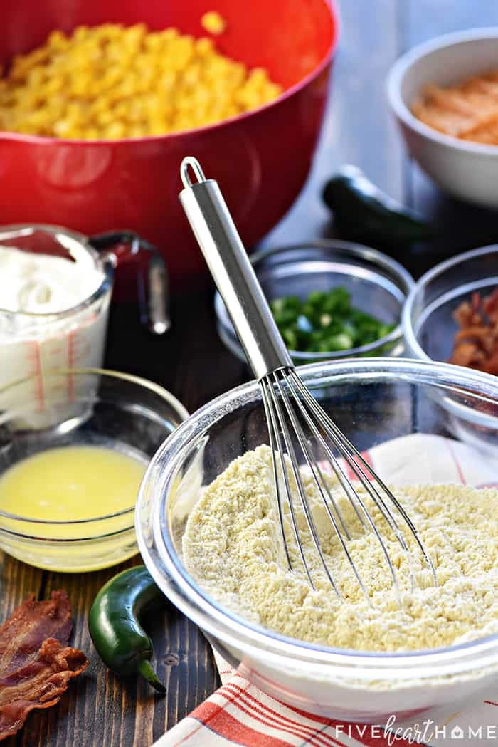 Ultimate Cornbread Casserole ~ with the addition of bacon, cheddar, and jalapeño, this flavorful, from-scratch recipe takes the classic side dish to a whole new level! | FiveHeartHome.com Ingredients arranged on table.
