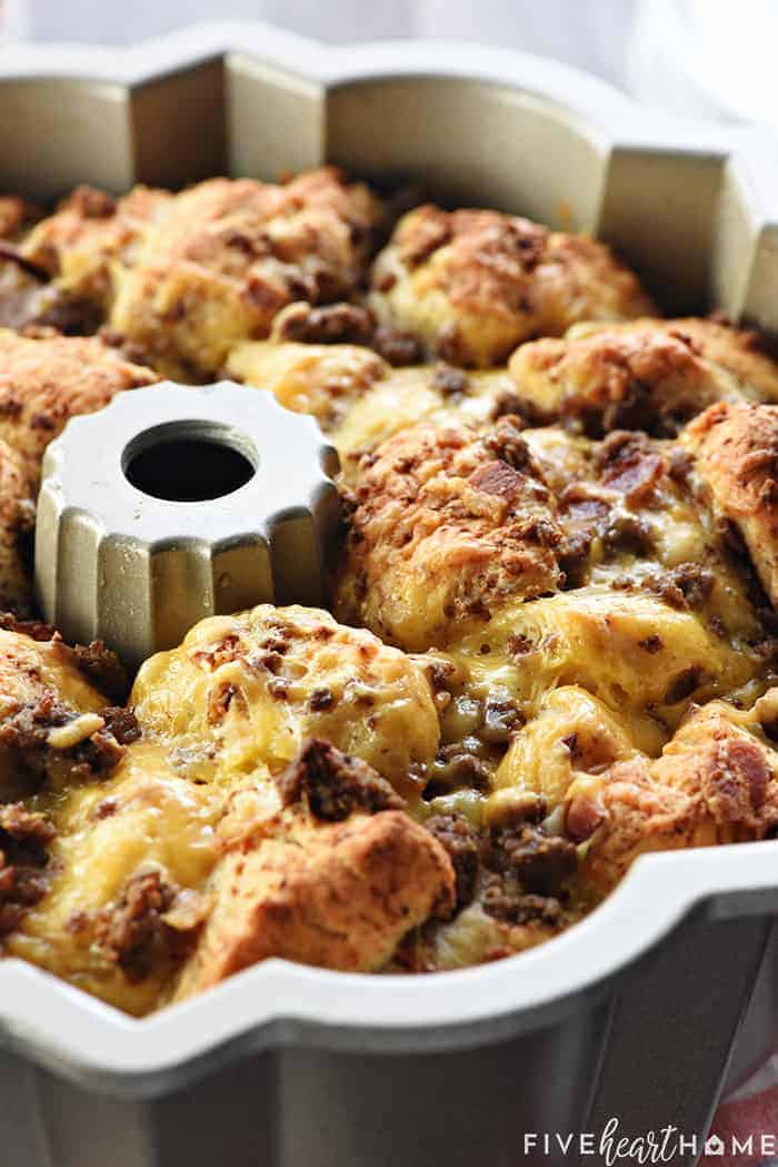 Bacon Cheeseburger Monkey Bread ~ loaded with ground beef, bacon, and cheddar, this gooey, savory, pull-apart recipe is a perfect appetizer for the Super Bowl or any party! | FiveHeartHome.com