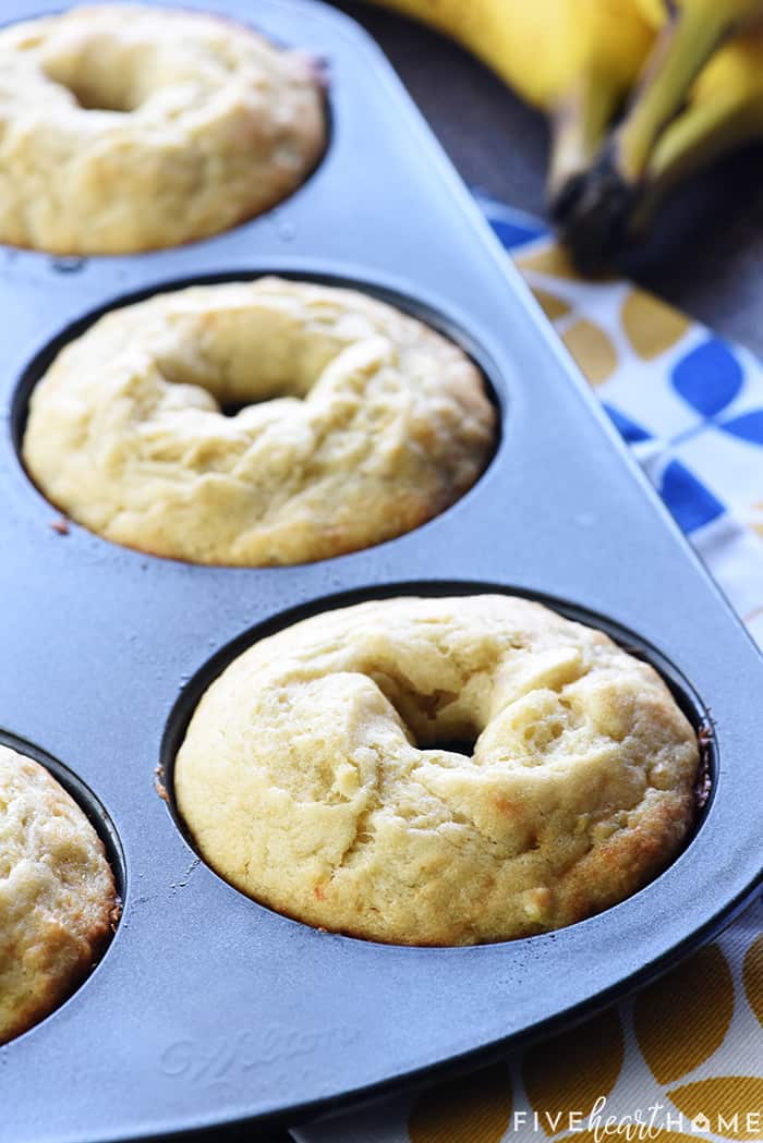 Baked Banana Donuts ~ soft, sweet, lightened-up, and easy to make, with your choice of a decadent chocolate glaze or a coating of cinnamon sugar! | FiveHeartHome.com Baked Donut Recipe in donut pan