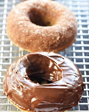 Baked Banana Donuts ~ soft, sweet, lightened-up, and easy to make, with your choice of a decadent chocolate glaze or a coating of cinnamon sugar! | FiveHeartHome.com