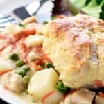 Chicken Pot Pie Casserole ~ this easy comfort food recipe features a classic filling of tender chicken, potatoes, carrots, and peas in a savory gravy topped with fluffy homemade drop biscuits! | FiveHeartHome.com