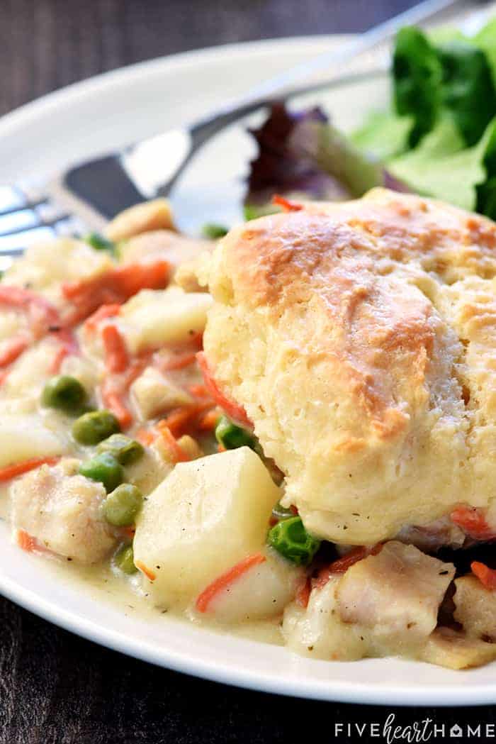 Chicken Pot Pie Casserole ~ this easy comfort food recipe features a classic filling of tender chicken, potatoes, carrots, and peas in a savory gravy topped with fluffy homemade drop biscuits! | FiveHeartHome.com