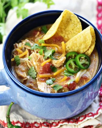 King Ranch Chicken Soup ~ a creamy and comforting soup recipe with all the zesty flavor of the classic casserole...and it's easy to make in the slow cooker, in the Instant Pot, or on the stove! | FiveHeartHome.com