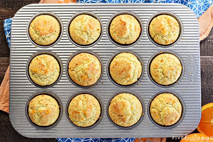 Orange Muffins ~ these lovely muffins are tender, and easy to make from scratch, with delicate flavors of vanilla and citrus from fresh orange juice and zest! | FiveHeartHome.com Aerial view of pan.